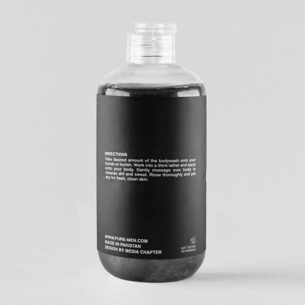 Bottle of body wash with black label on a gray background