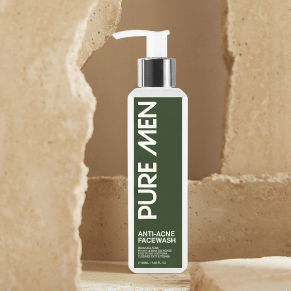 Bottle of Pure Men anti-acne facewash on a beige stone background