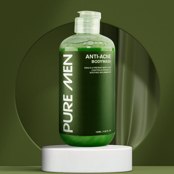 Green bottle of Pure Men Anti-Acne Bodywash on a green background