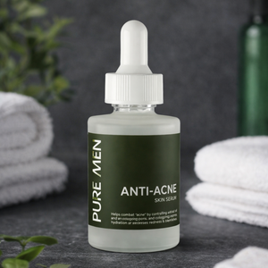 Bottle of Pure Men Anti-Acne Skin Serum on a dark surface with towels and cotton swabs in the background.