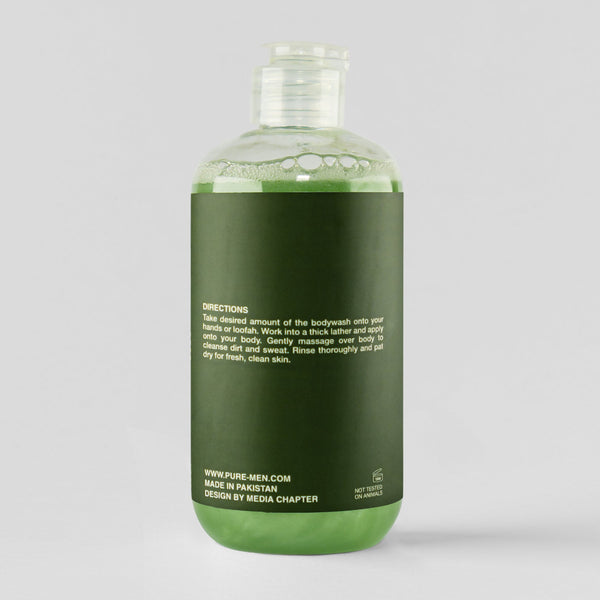 Green bottle with label on a gray background