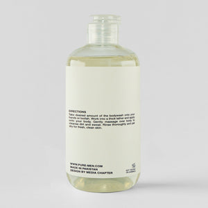 Bottle of body wash with label on a white background
