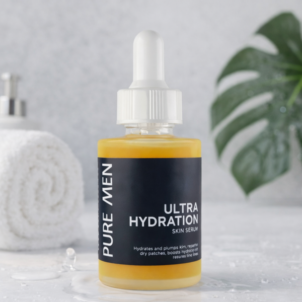 Bottle of Pure Men Ultra Hydration Skin Serum on a light background with a plant leaf.