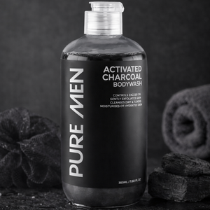 Bottle of Pure Men Activated Charcoal Body Wash with black background